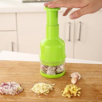 New Practical Garlic Onion Pressing Gadget Slicer Peeler Green Kitchen Tool