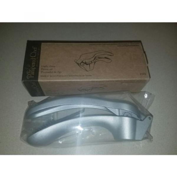 The Pampered Chef Garlic Press #2576 with cleaning tool #1 image
